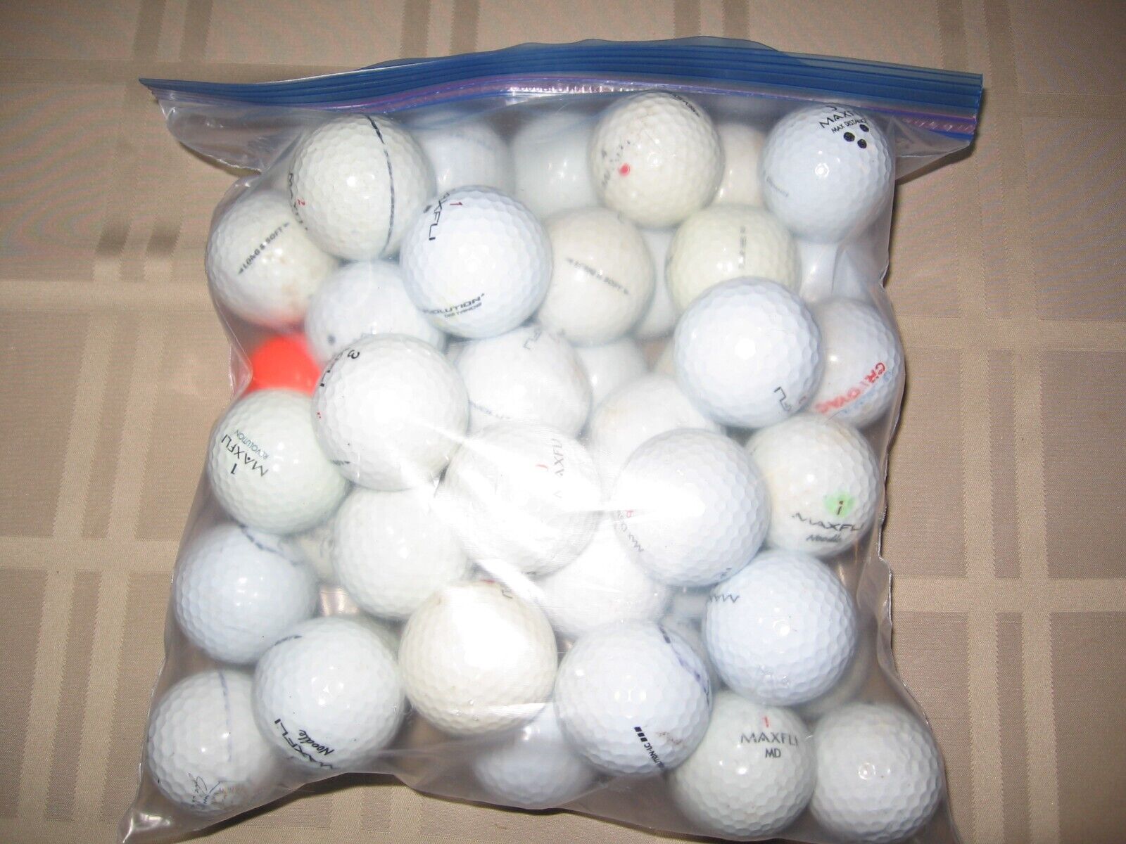25 lightly used Max-Fli golf balls.  Great condition.