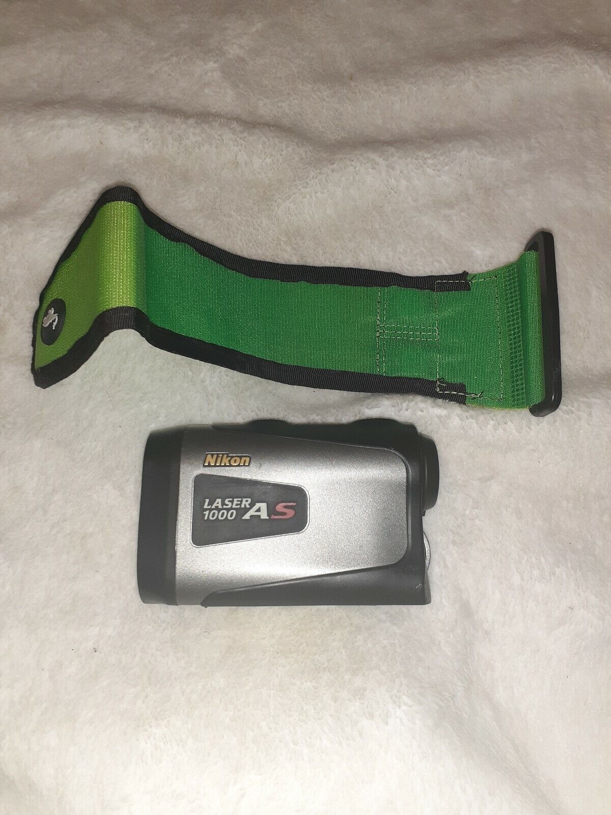 Nikon Wx034660 Laser 1000As Body with green stick it wrap. Missing battery cover