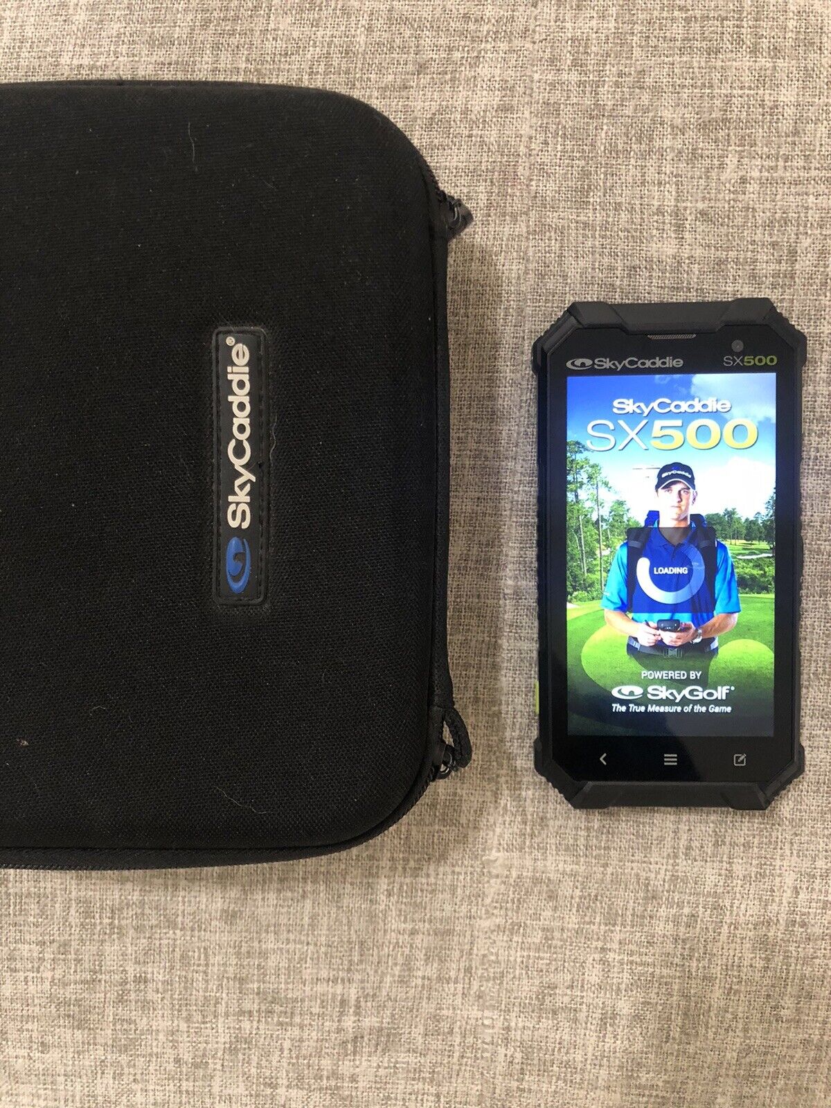 SkyCaddie SX500 Golf GPS Rangefinder with Charger, Travel Case, And Leather Case