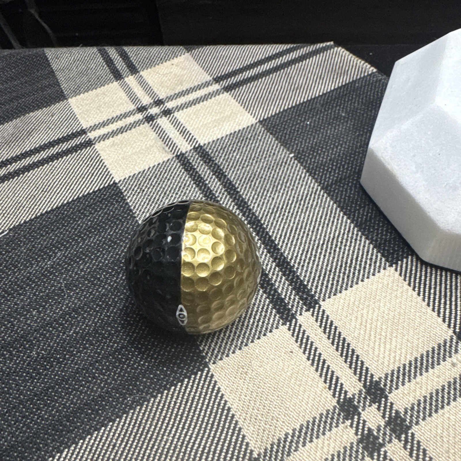 VINATGE BLACK AND GOLD PING GOLF BALL